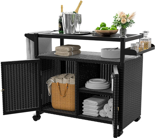 Xilingol Outdoor Bar Table, Wicker Bar Cart with Cabinet, Patio Serving Cart with Tempered Glass Top, Lockable Wheels, Rounded Handle & Side Basket for Garden, Poolside & Backyard, Black